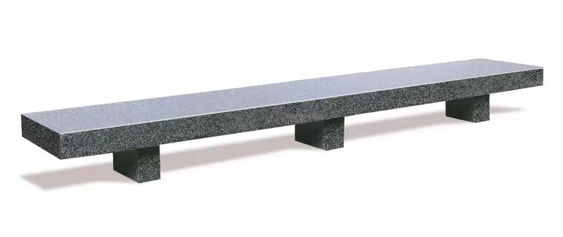 Long concrete bench with three legs